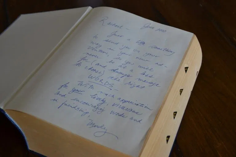 A handwritten letter on a book from Wendy